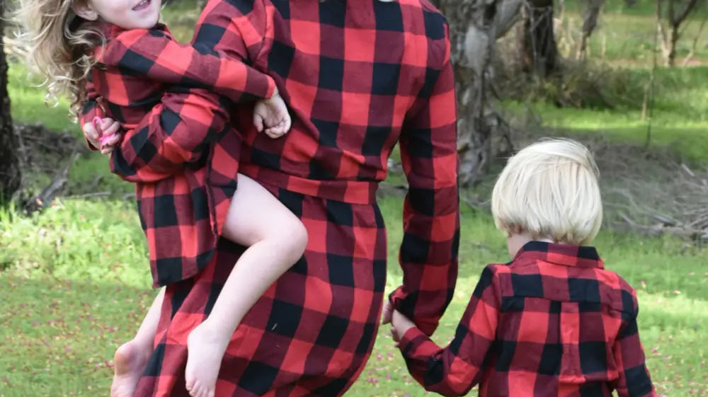 Picture of a mother and her children wearing matching shirts