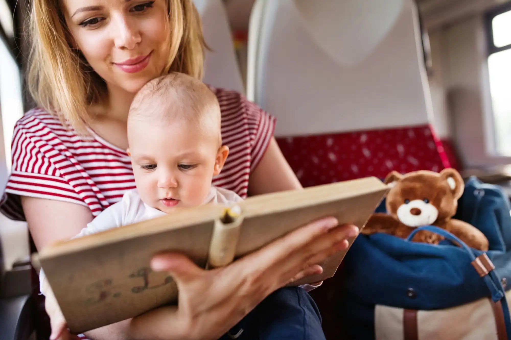 Picture of a mother and her baby in an airplane