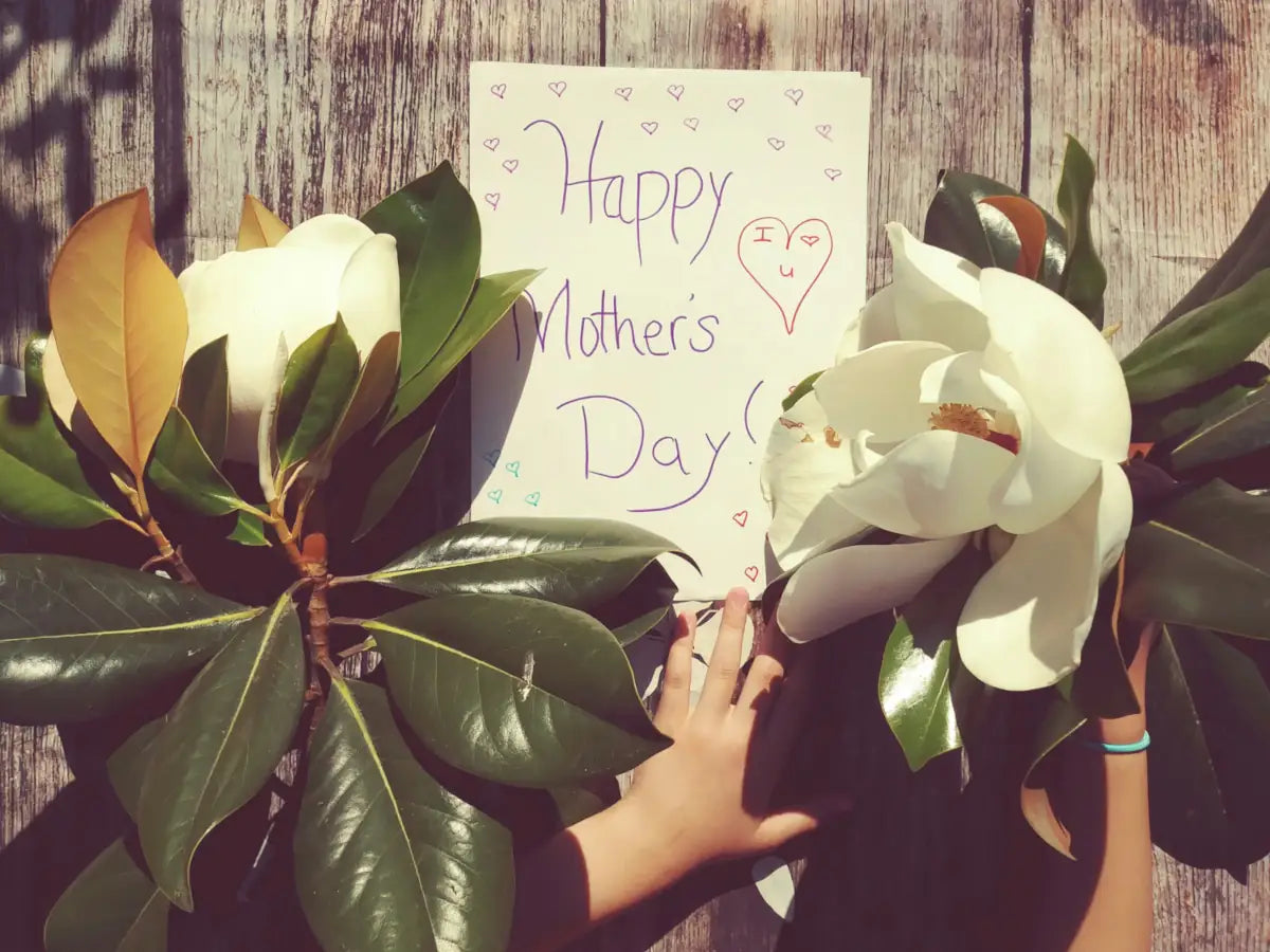 picture of a mother's day cart surrounded by flowers